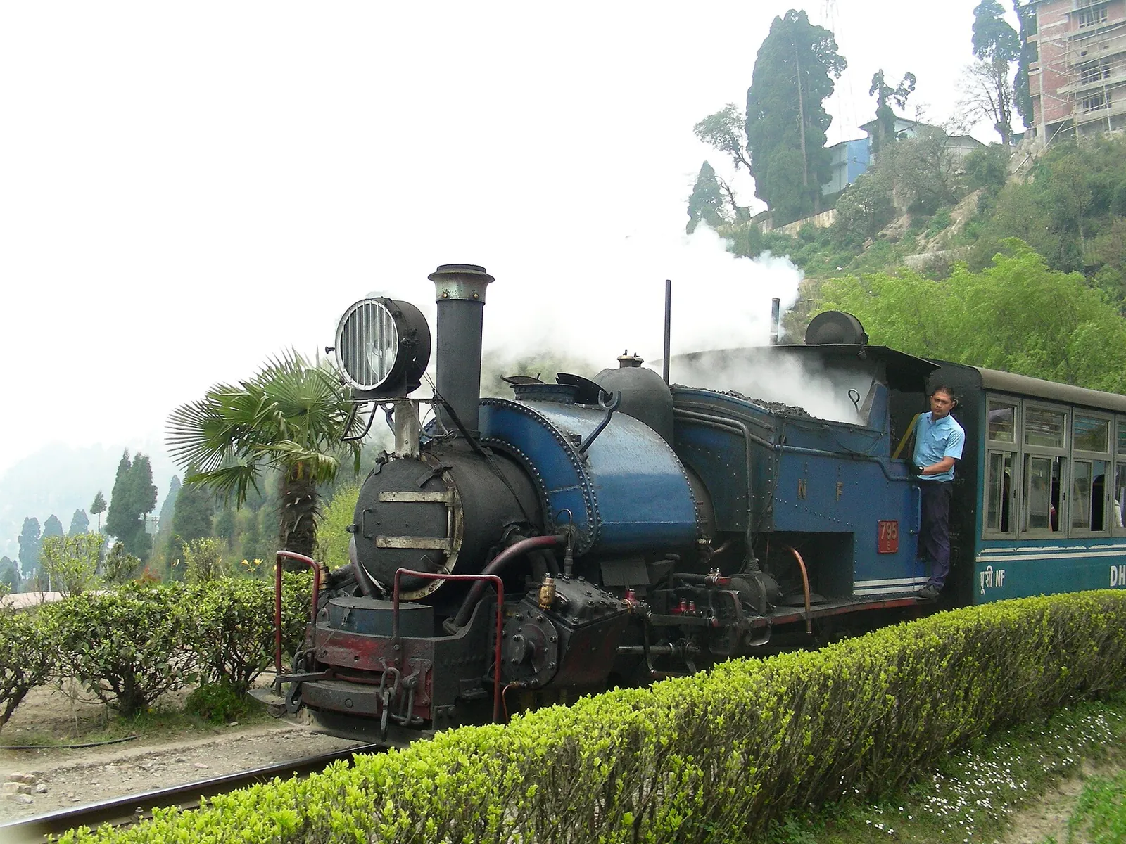 Blue steam locomotive of the Darjeeling Himalayan Railway