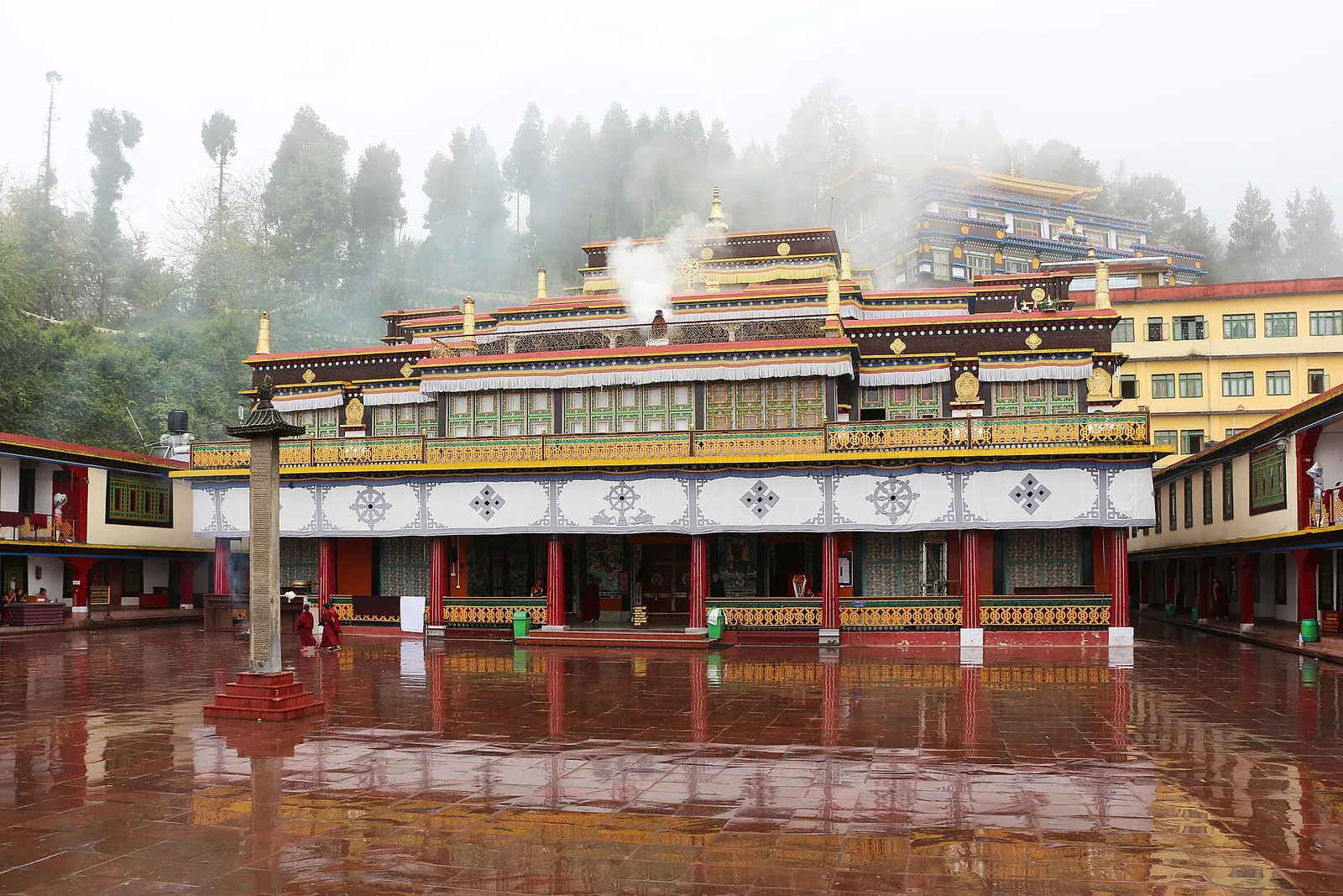 Rumtek Monastery courtyard in the mist after rain